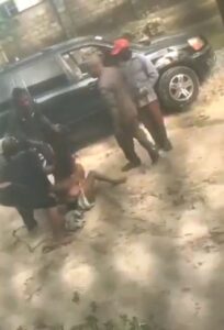 Boobs Out As Nigerian Police Strip Woman With Big Breasts Naked In Public (18+) Boobs Out As Nigerian Police Strip Woman With Big Breasts Naked In Public (18+)