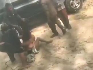 Boobs Out As Nigerian Police Strip Woman With Big Breasts Naked In Public (18+)