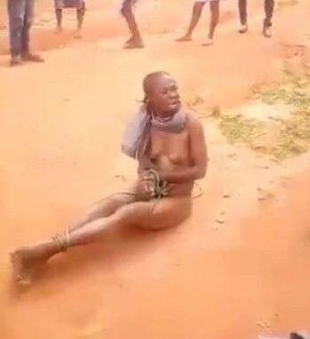 Nigerian Girl With Nice Breasts Stripped Naked In Public And Tied For Stealing (18+)