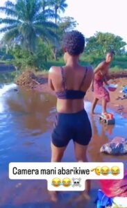 African Girl Showing Breasts In A River In Public (18+)